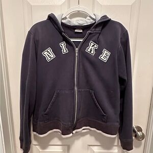 Vintage Nike hoodie. Size Large. Fair condition. The color is navy blue